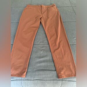 Vuori Men's Chino Pants in Rust Orange
